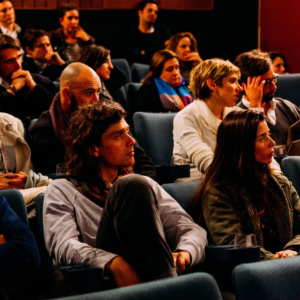 People listening at a conference